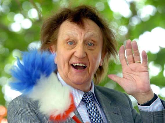 Ken Dodd, who has died at the age of 90.