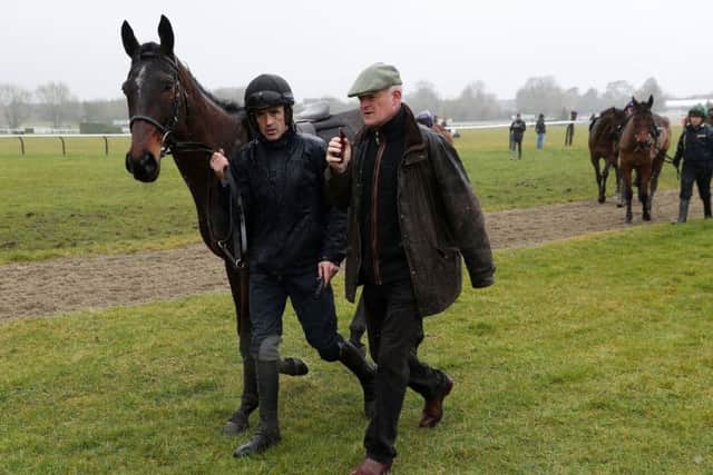 Jockey Ruby Walsh with trainer Willie Mullins and Benie Des Dieux during a preview day ahead of the 2018 Cheltenham Festival meeting. (Picture: David Davies/PA Wire)