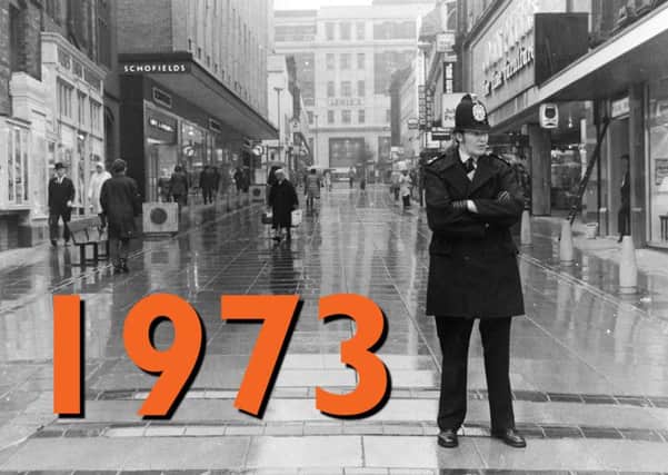 A policeman stands at the Lands Lane entrance to Leeds city centre precinct to enforce a total ban on traffic in 1973.