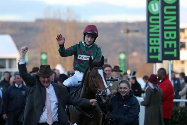 North Yorkshire jockey Brian Hughes returns to the winner's enclosure after landing the finale on Mister Whitaker.