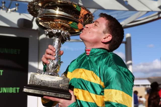 Barry Geraghty celebrates victory in the Unibet Champion Hurdle.