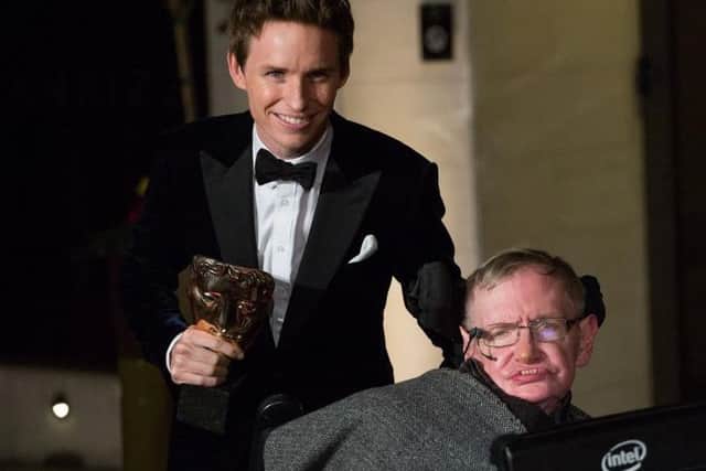 Eddie Redmayne and Professor Stephen Hawking, who has died aged 76, arriving at the After-party dinner for the EE British Academy Film Awards in 2015. Picture: Daniel Leal-Olivas/PA Wire