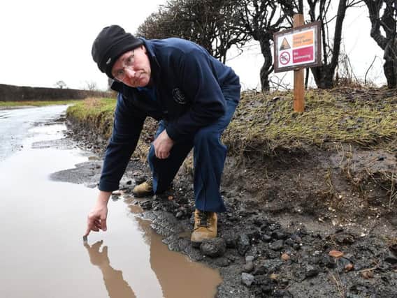 You'd better not try to swim in this six-inch pothole