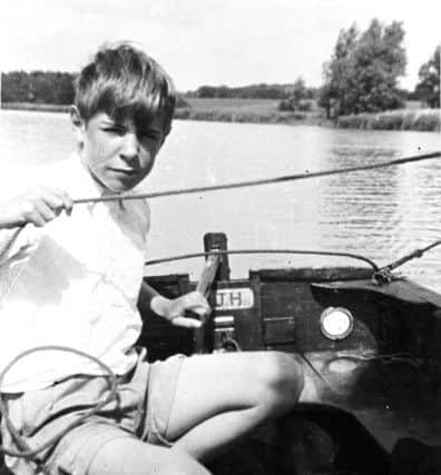 Stephen Hawking fishing when he was a young boy.