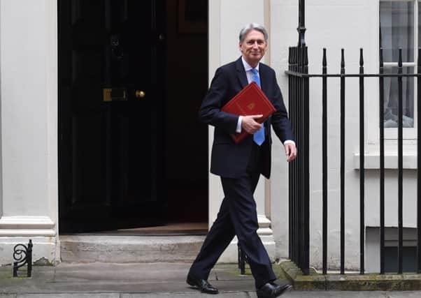 Chancellor of the Exchequer Philip Hammond leaves 11 Downing Street
