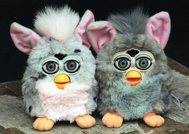 The Furby which  featured at the Toy '98 showcase of top toys for this Christmas,  in London today (Wednesday). The Furby is just over six inches tall and retails at Â£29.99.  It has its own language of chirps, cheeps and chirrups and comes complete with an English-Furby dictionary for its 200-words and 800 phrases which include 'a-tay' for 'I'm hungry' and 'way-loh' for sleep.    Photo by Matthew Fearn.