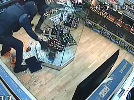 CCTV footage shows the gang raiding the shop with their machetes.