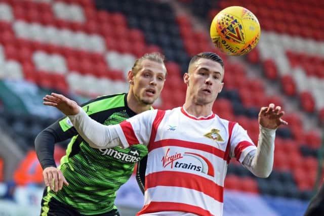 Doncaster's Tommy Rowe in action against Plymouth Argyle. (Picture: Marie Caley)