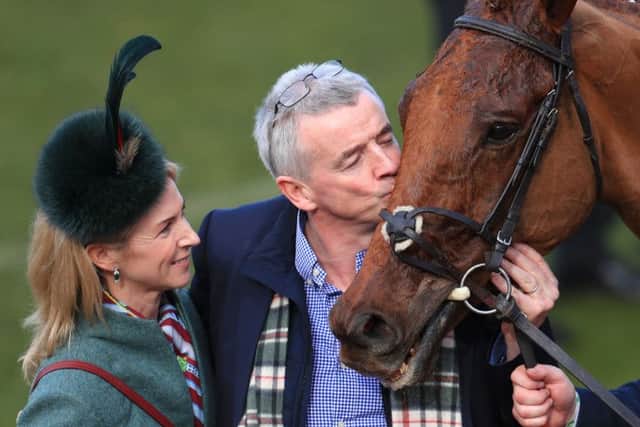 Owner Michael O'Leary kisses Balko Des Flos after winning the Ryanair Chase at Cheltenham. Picture: Mike Egerton/PA