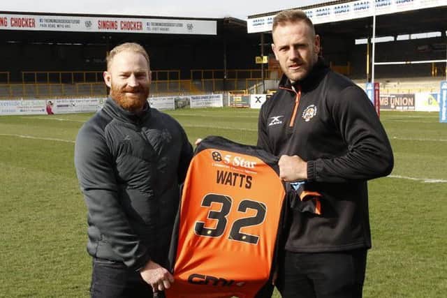 New Castleford Tigers' signing Liam Watts, right, with John Wells.