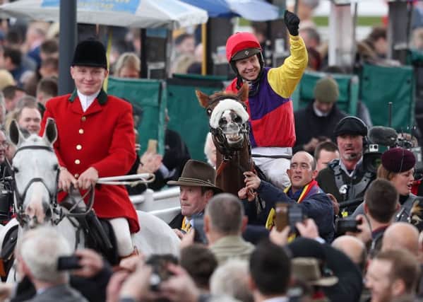 Richard Johnson celebrates his victory on Native River in the Timico Cheltenham Gold Cup (Picture: David Davies/PA Wire)