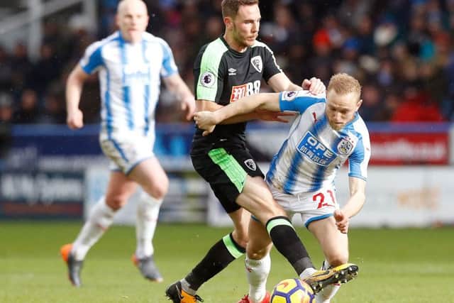 Huddersfield Town's January signing Alex Pritchard is proving an effective foil for striker Steve Mounie (Picture: Martin Rickett/PA Wire).
