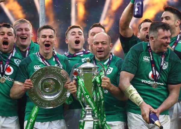 Ireland's Rory Best celebrates with the trophy after winning the grand slam.