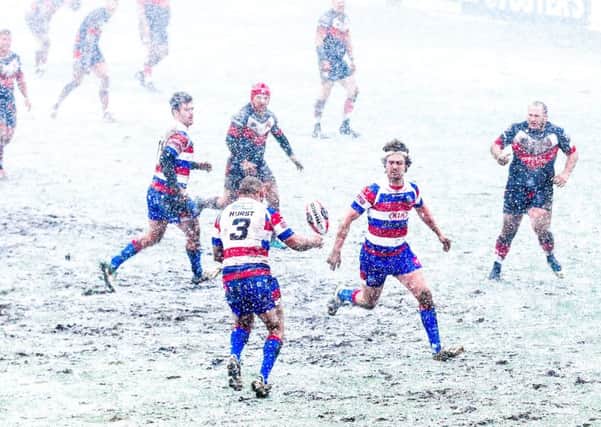 Heavy snow during the game between Normanton Knights and Rochdale, at The LD Nutrition Stadium, Featherstone. Picture: Alex Whitehead/SWpix.com