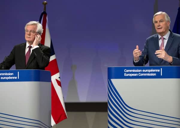 David Davis and Michel Barnier spoke of Brexit taking significant steps forward. (PA).