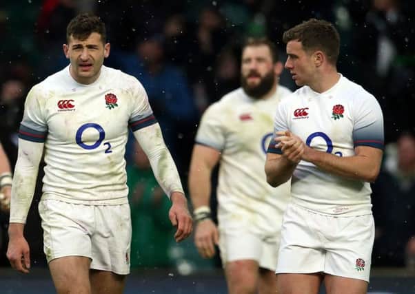 Dejected: Jonny May, left, and his England team-mates leave the field after a meek surrender to grand slam champions Ireland. (Picture: PA)