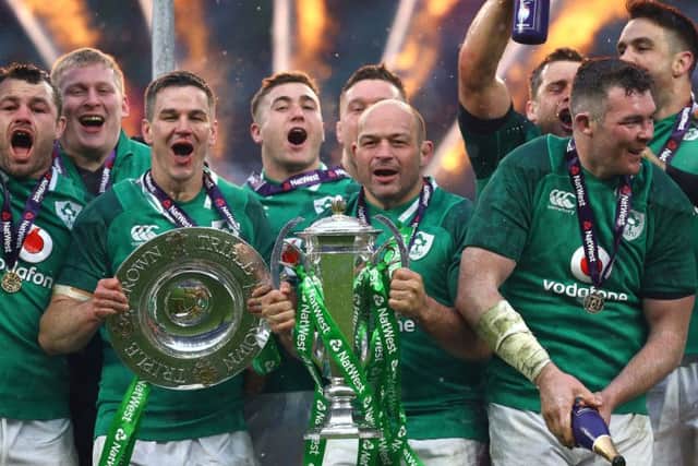 Ireland's Rory Best celebrates with the trophy after winning the grand slam during the NatWest 6 Nations match at Twickenham Stadium, London. (Picture: Gareth Fuller/PA Wire)