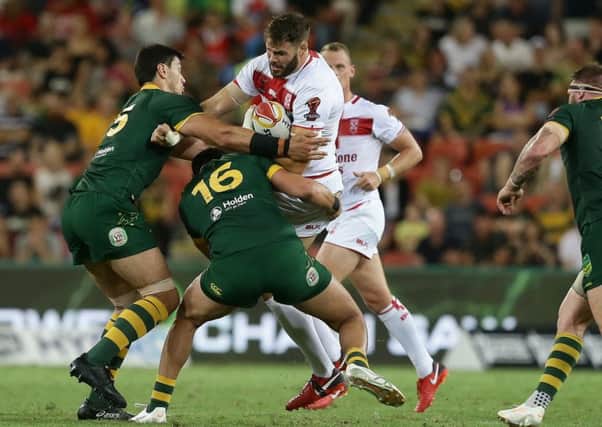Alex Walmsley in action for England in last December's Rugby League World Cup final against Australia (Picture: SWpix.com/PhotosportNZ).