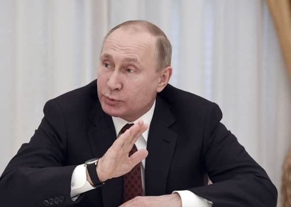 Is Russia under President Vladimir Putin a threat to the West? (Picture: AP).