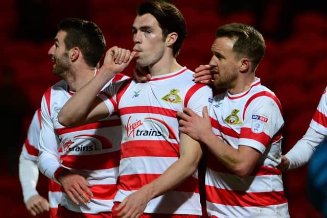 Doncaster Rovers' John Marquis celebrates his opening goal against Bradford City (Picture: Bruce Rollinson).