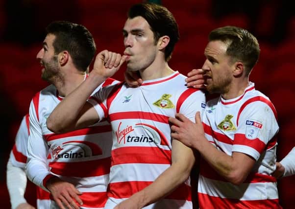 Thumbs up: Rovers' John Marquis celebrates his opening goal against Bradford.  Picture: Bruce Rollinson