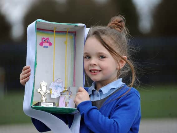 Faye Clayton from Thorpe Primary School takes part in the 'I Am' arts project by creating her shoebox. Picture Scott Merrylees.
