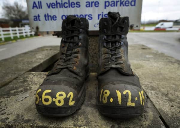 There has been a surge of interest in reminders of the collieries which produced a peak of 281 million tonnes of coal, an era which came to the end with the closure of Kellingley in 2015. 


A pair of miners boots left at the main gate with the date of the last shift painted on the toe cap.
Kellingley Colliery where contractors from Hydroblast, Northallerton, have been the last in the pit shafts preparing the way for UK Coal to cap the shafts with concrete sealing the mine forever.  
(l-r) Ross McDonald, Ashton Coetzee, Ken Verity and Gerlad McDonald in the pit shaft at Kellingley.
29 February 2016.  Picture Bruce Rollinson