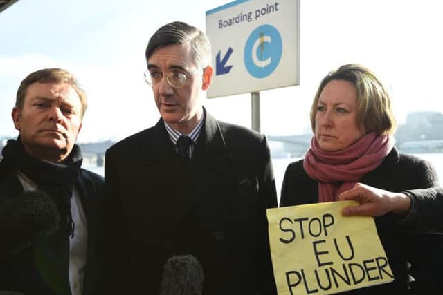 Conservative MPs Craig Mackinlay and Anne-Marie-Trevelyan stand with Jacob Rees-Mogg (centre) as they speak at a press conference on Embankment Pier.