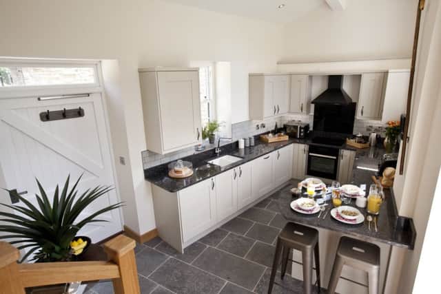 The Shaker-style kitchen units from MKM were topped with an expensive granite worktop.