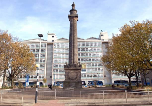 Hull College in Queens Gardens - with the statue of William Wilberforce - where job cuts are likely. PICTURE: TERRY CARROTT