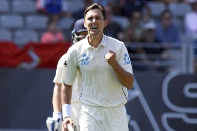Gone: New Zealand's Trent Boult celebrates the wicket of England's Ben Stokes.