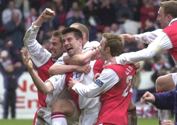 Going up: Rotherham United clinched promotion to Division 1 after beating Brentford thanks to Alan Lee's last-minute winner in 2001.