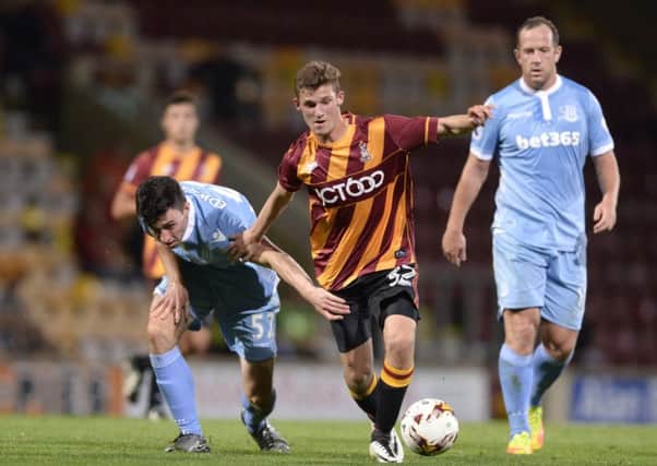 Stepping in: Ellis Hudson, in action for 
Bradford City against  Stoke, has joined Guiseley.