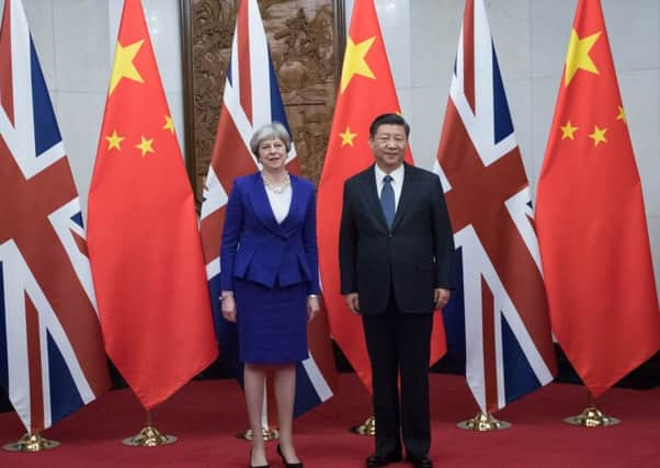 Theresa May made an official visit to China last month to encourage post-Brexit investment in the UK. But will Britain be stronger once it leaves the EU?  (Picture: Stefan Rousseau /PA wire).