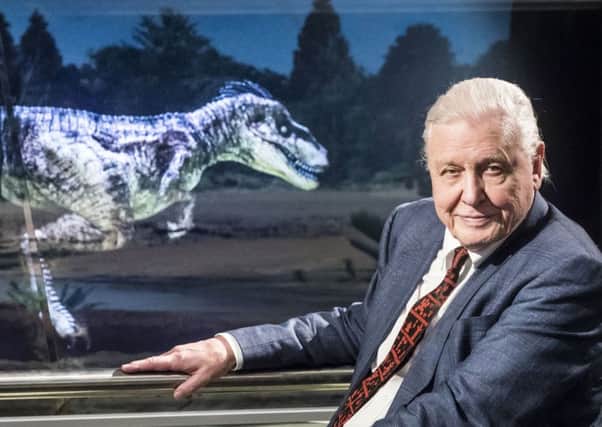 Sir David Attenborough is pictured with an animated, computer generated, Theropod dinosaur as he officially opens Yorkshire's Jurassic World at the Yorkshire Museum in York. PRESS ASSOCIATION Photo. Picture date: Friday March 23, 2018. Yorkshire's Jurassic World combines internationally significant collections with the latest technology to transport visitors back to the deep seas, tropical reefs and dinosaur country which made up the land we now call Yorkshire more than 150 million years ago.