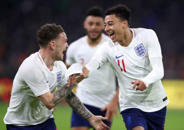 England's Jesse Lingard, right, is jubilanty after scoring the only goal of the game against Holland in Amsterdam (Picture: Nick Potts/PA Wire).
