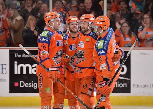 Sheffield Steelers' players celebrate scoring during their 11-2 win over Edinburgh Capitals. 
Picture: Dean Woolley
.