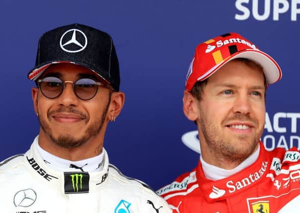 RIVALS: Mercedes' Lewis Hamilton and Ferrari's Sebastian Vettel. Picture: Tim Goode/PA.