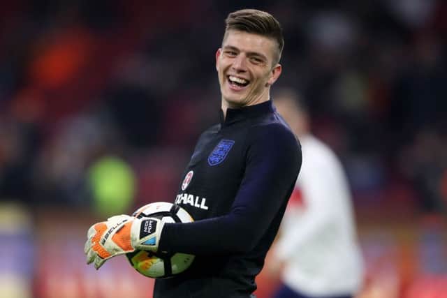England goalkeeper Nick Pope shares a joke during the international friendly match at the Amsterdam ArenA last Friday. (Picture: PA)