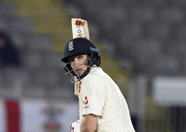 England's Joe Root looks back after being caught out on 51 by New Zealand's BJ Watling. Picture: AP/Ross Setford