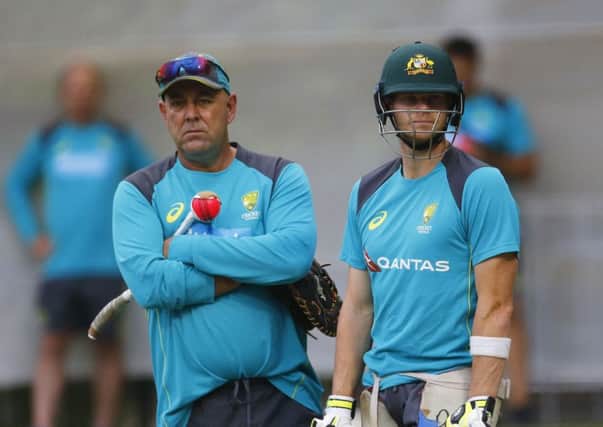 Australia's Steve Smith and coach Darren Lehmann. Picture: Jason O'Brien/PA