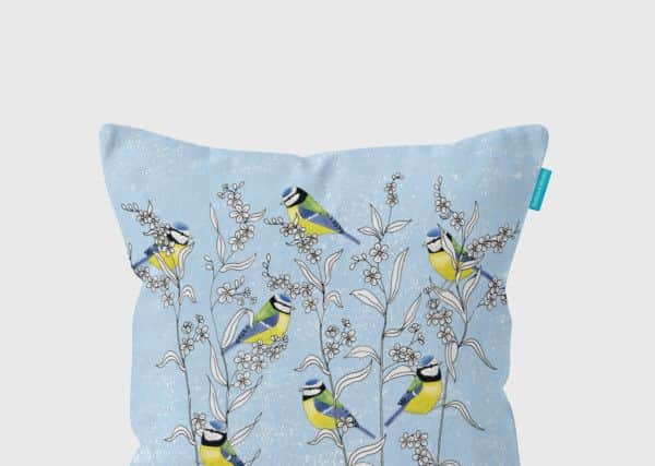 Blue tits and forget-me-nots cushion, Â£39.95, www.annabeljames.co.uk