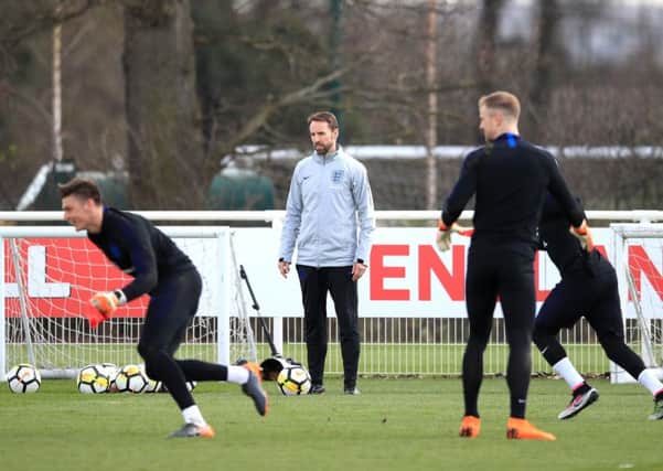 England manager Gareth Southgate supervises a training session at Enfield training ground yesterday ahead of playing Italy tonight (Picture: Adam Davy/PA Wire).
