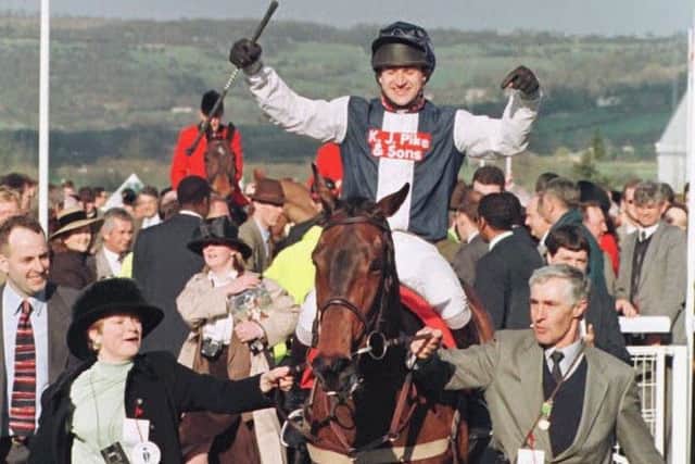 Owner Dido Harding leads Cool Dawn and Andrew Thornton into the Cheltenham winner's enclosure.