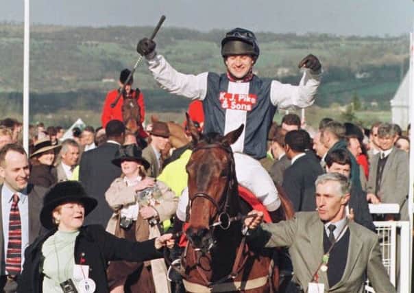 Owner Dido Harding leads Cool Dawn and Andrew Thornton into the Cheltenham winner's enclosure.