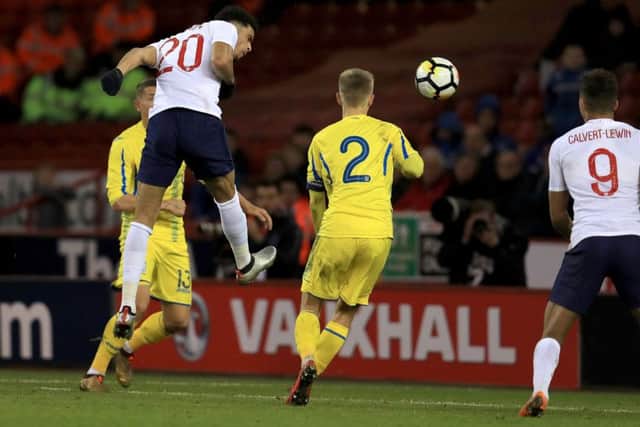 Dominic Solanke rises to head home England Under-21s winner against Ukraine Under-21s at Bramall Lane (Picture: Mike Egerton/PA Wire).