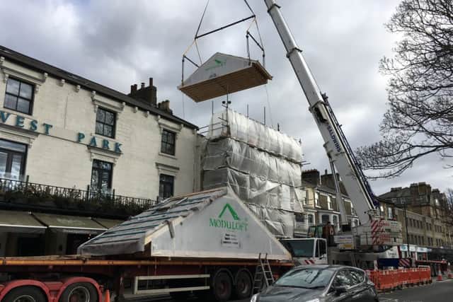 The roof of the new modular penthouse being cramed onto the building in West Park, Harrogate