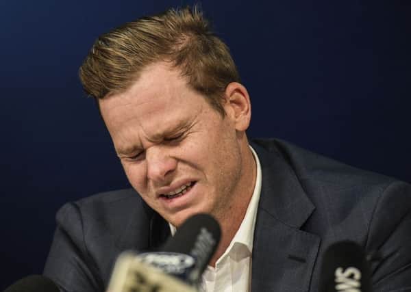 Sorry: Australia captain Steve Smith reacts during his press conference at Sydney International Airport.