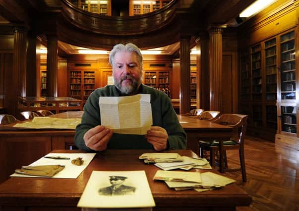 Richard High, in the Special Collections department at the University of Leeds with some of the items relating to Frederick Caton. (Simon Hulme).