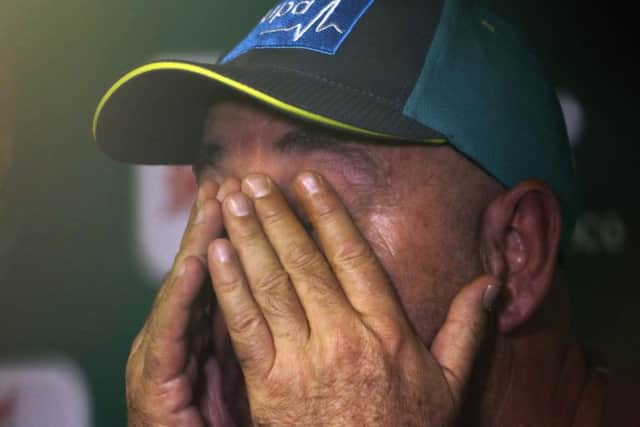 Australia's coach Darren Lehmann wipes away tears as he announces that he is quitting as the team coach (Picture: Themba Hadebe/AP).
